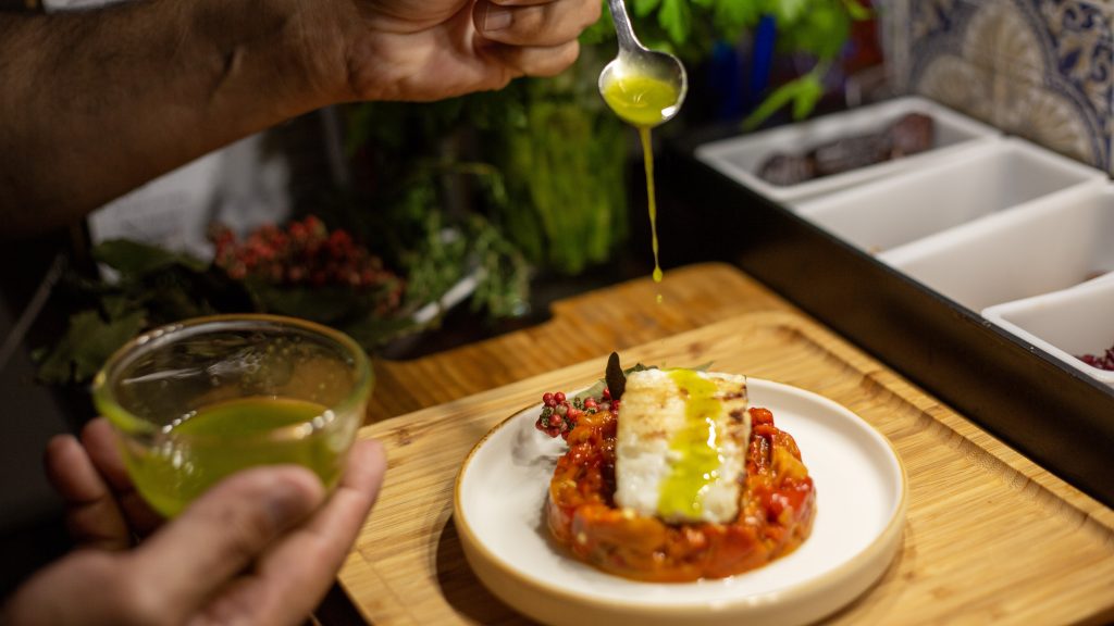 Customers enjoying Spanish tapas at Iber&Co in Malta
