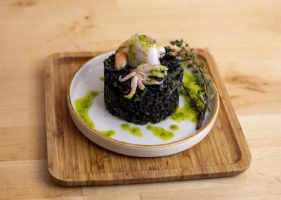 Ink style octopus - garlic prawns - Spanish Food Malta