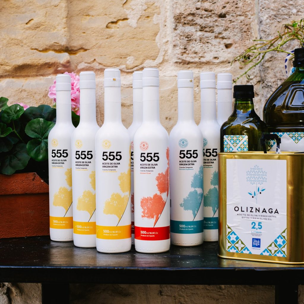 Bottle of EVOO with olive branch