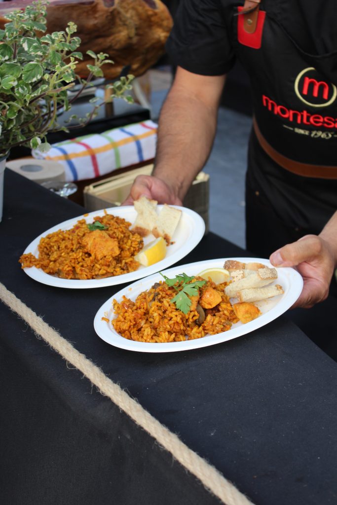 Freshly cooked paella being served at Iber&Co’s stand