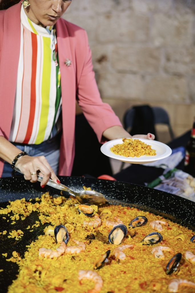 Iber&Co team serving paella at Fort St Angelo during the Malta International Fireworks Festival