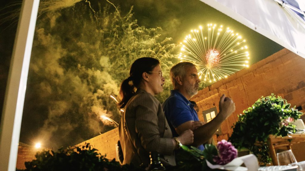 Iber&Co team serving paella at Fort St Angelo during the Malta International Fireworks Festival
